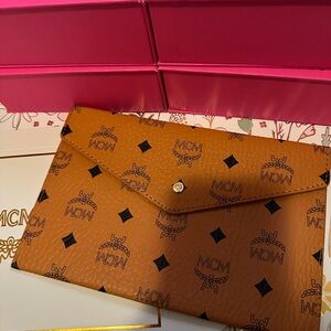 MCM Brown Logo Clutch